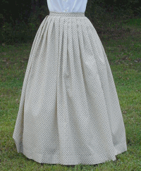 Camp Skirt Type II Cream color with small prints being worn over a corded petty coat